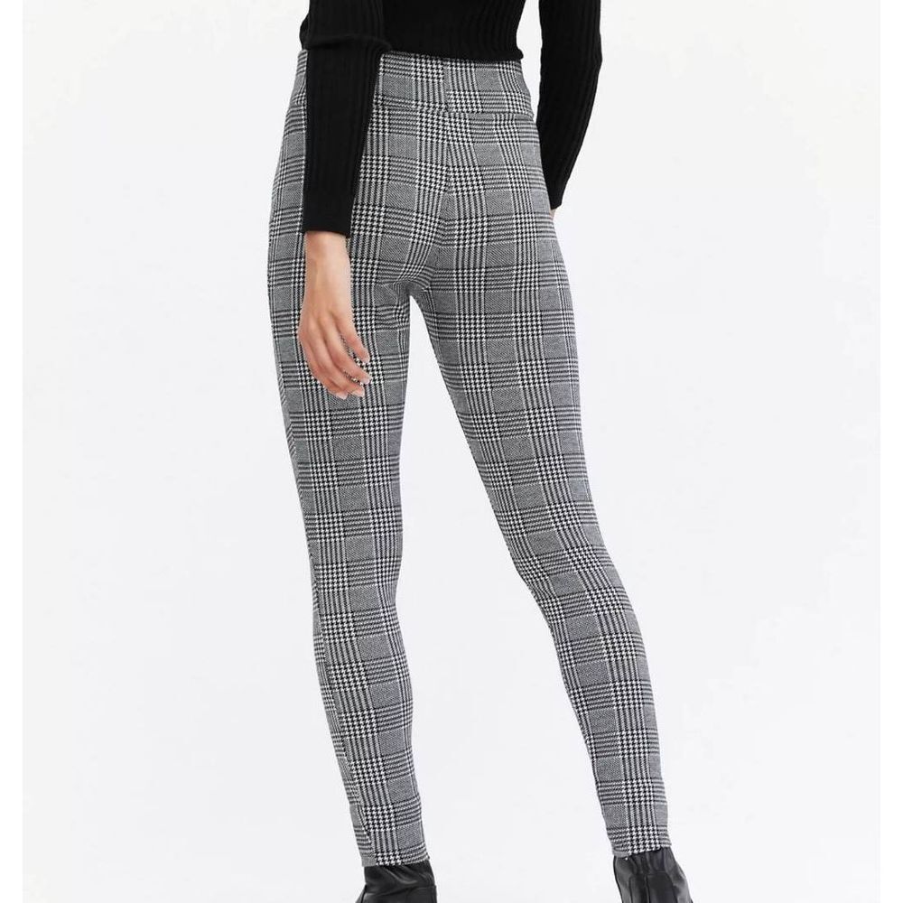 ASOS New Look leggings in black check.